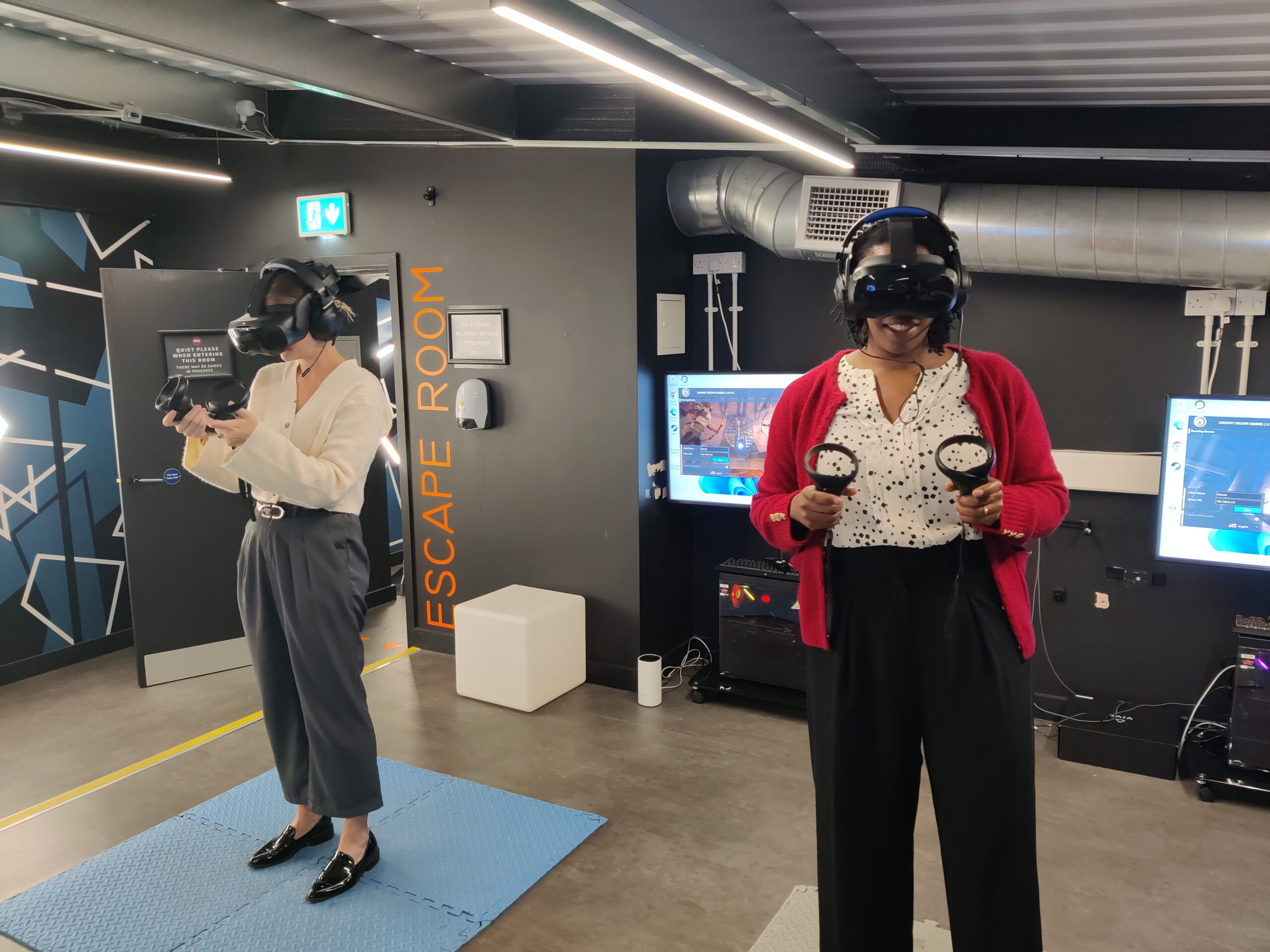 Co-founders charlie and janet using VR headset together